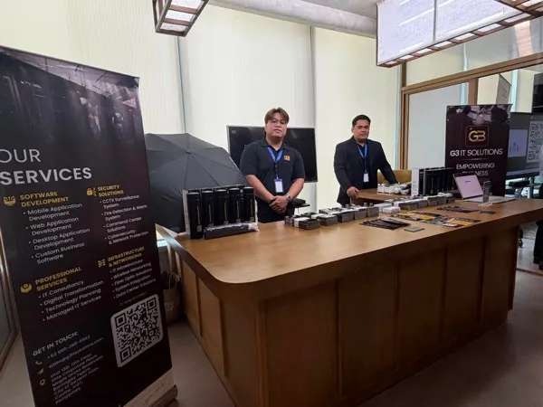 G3 booth with the services banner on display